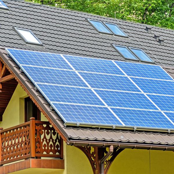 A solar panel on top of a house